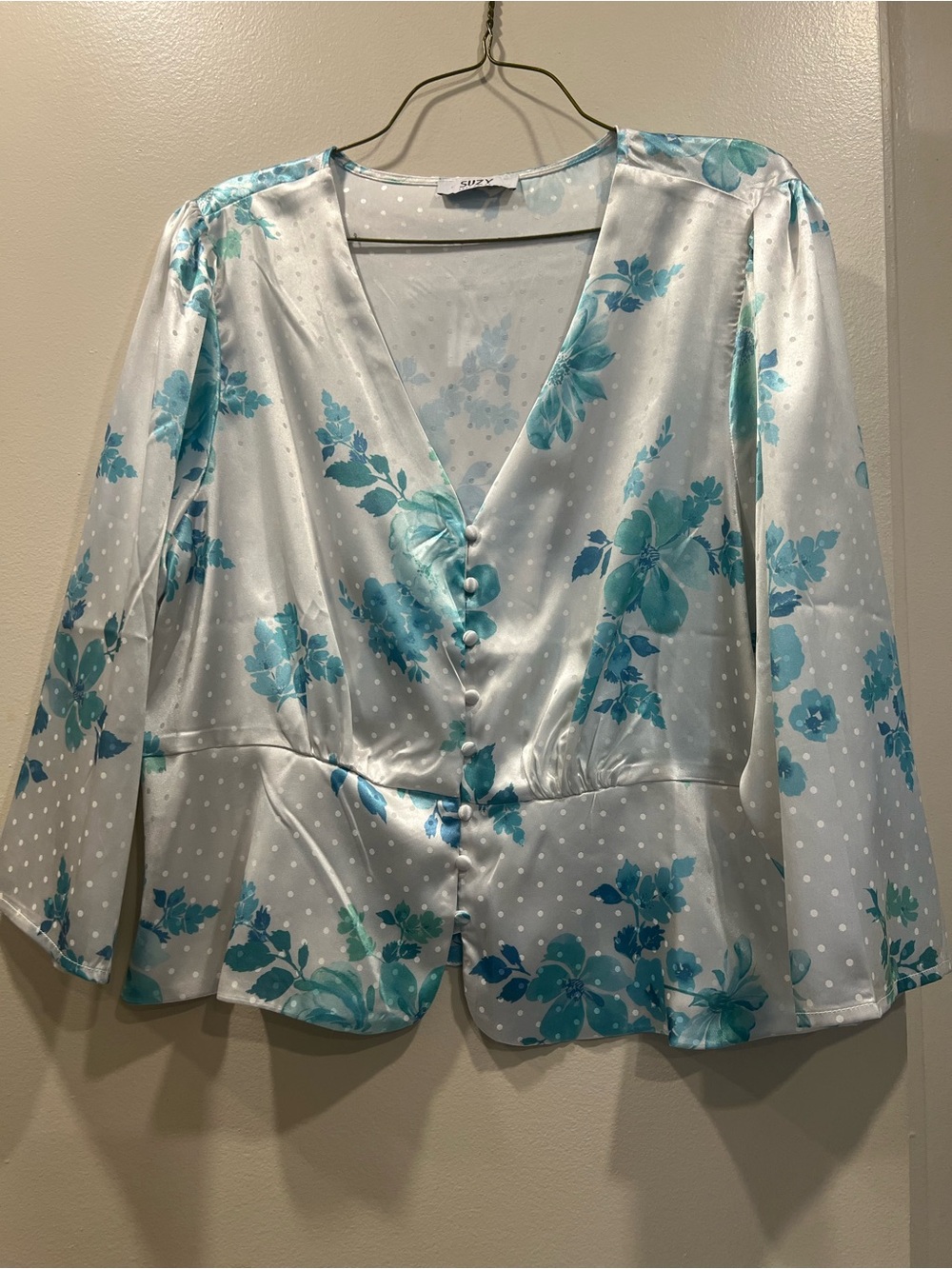 Blue Floral Satin Button-Front Blouse. Never worn. Polyester spandex
